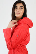 Lipstick Crush No 5 raincoat in bold red, lightweight hooded waterproof raincoat perfect for South Africa’s rainy climate