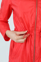 Lipstick Crush No 5 raincoat in bold red, lightweight hooded waterproof raincoat perfect for South Africa’s rainy climate