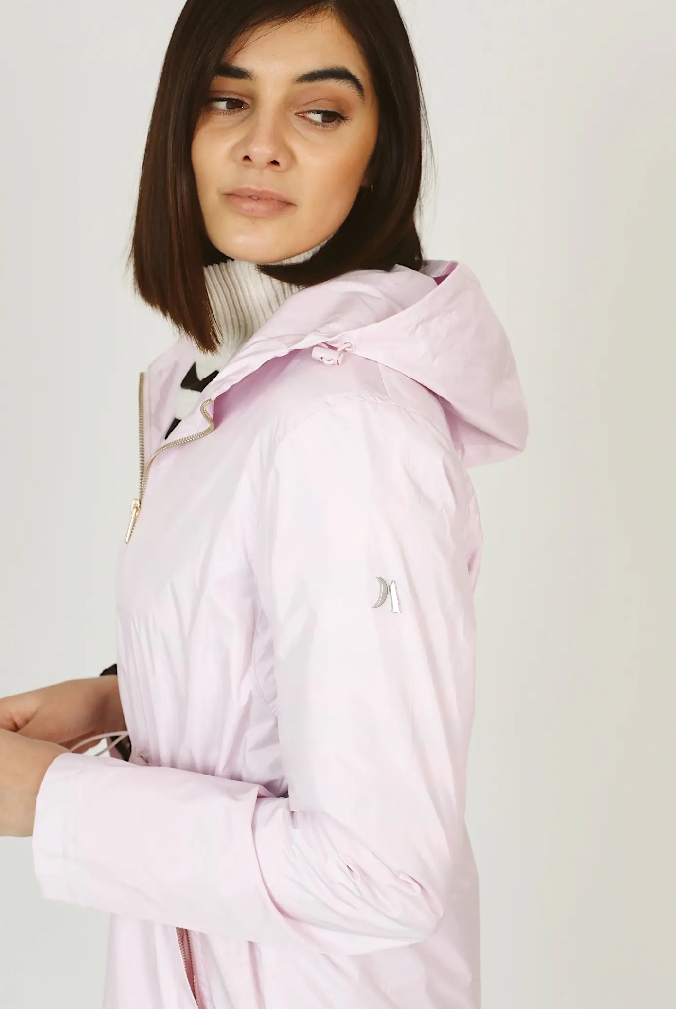 Rosewater Mist raincoat in pastel pink with hood, lightweight waterproof jacket for stylish rainy days in South Africa