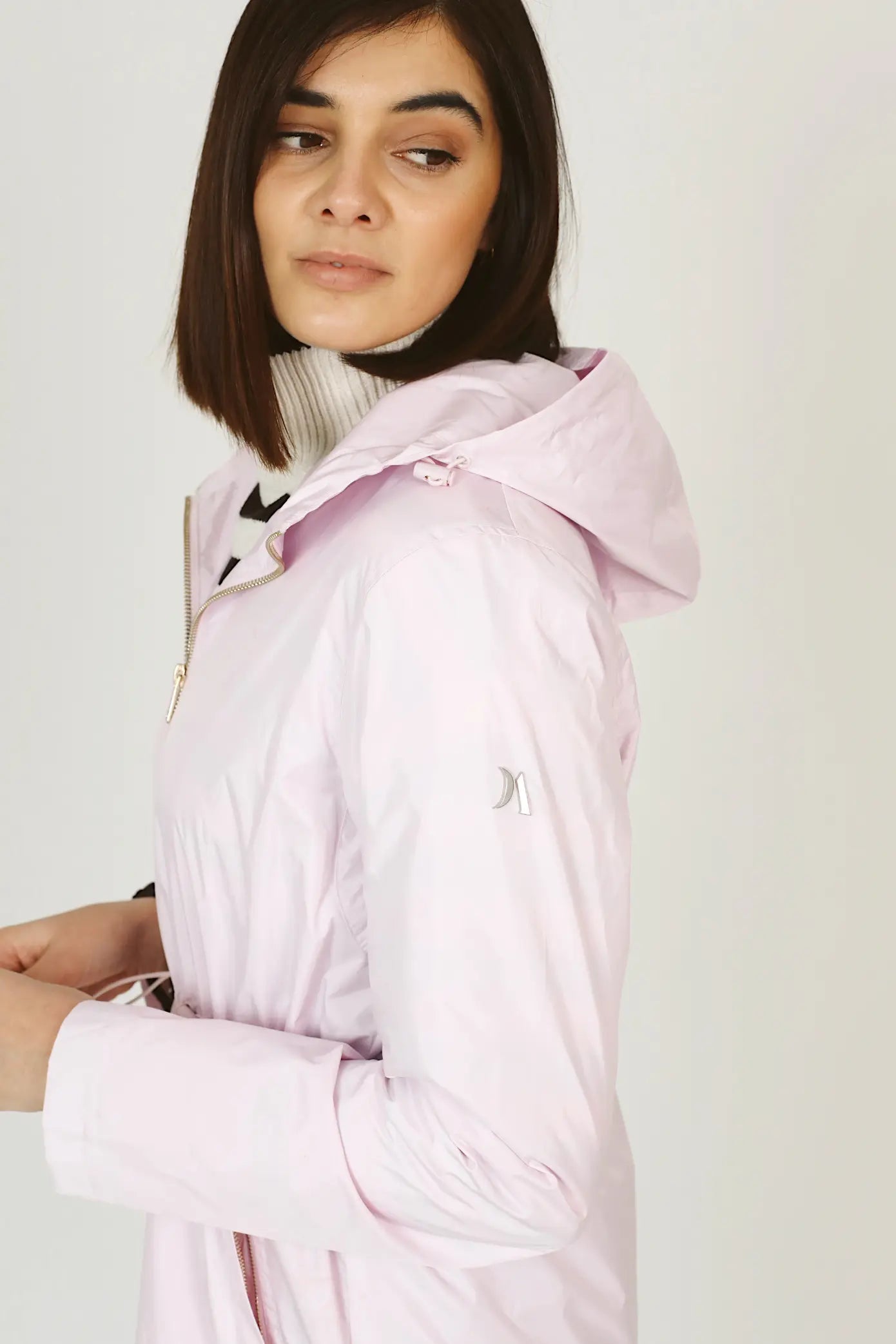 Rosewater Mist raincoat in pastel pink with hood, lightweight waterproof jacket for stylish rainy days in South Africa