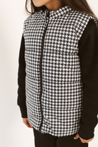 Kids Houndstooth x Black Gilet™ — sleeveless black puffer vest with bold houndstooth print, a versatile winter layer for kids in South Africa