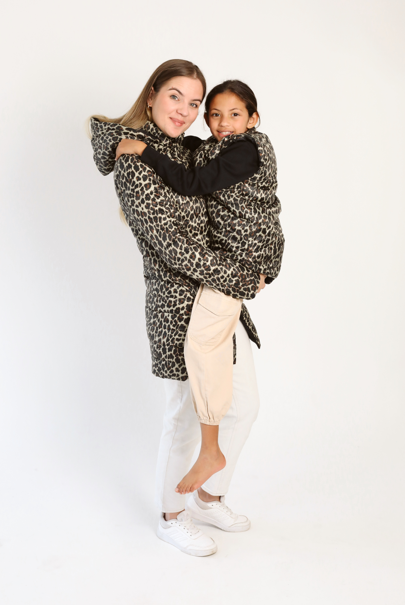 Kids Leopard x Black Gilet™ — sleeveless kids’ puffer vest in bold leopard print with black accents, a fun winter essential in South Africa