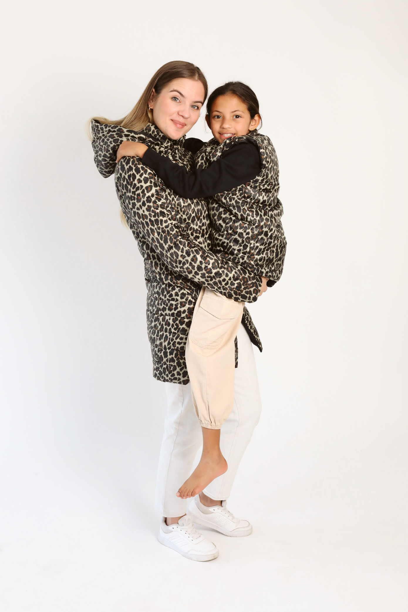 Kids Leopard x Black Gilet™ — sleeveless kids’ puffer vest in bold leopard print with black accents, a fun winter essential in South Africa