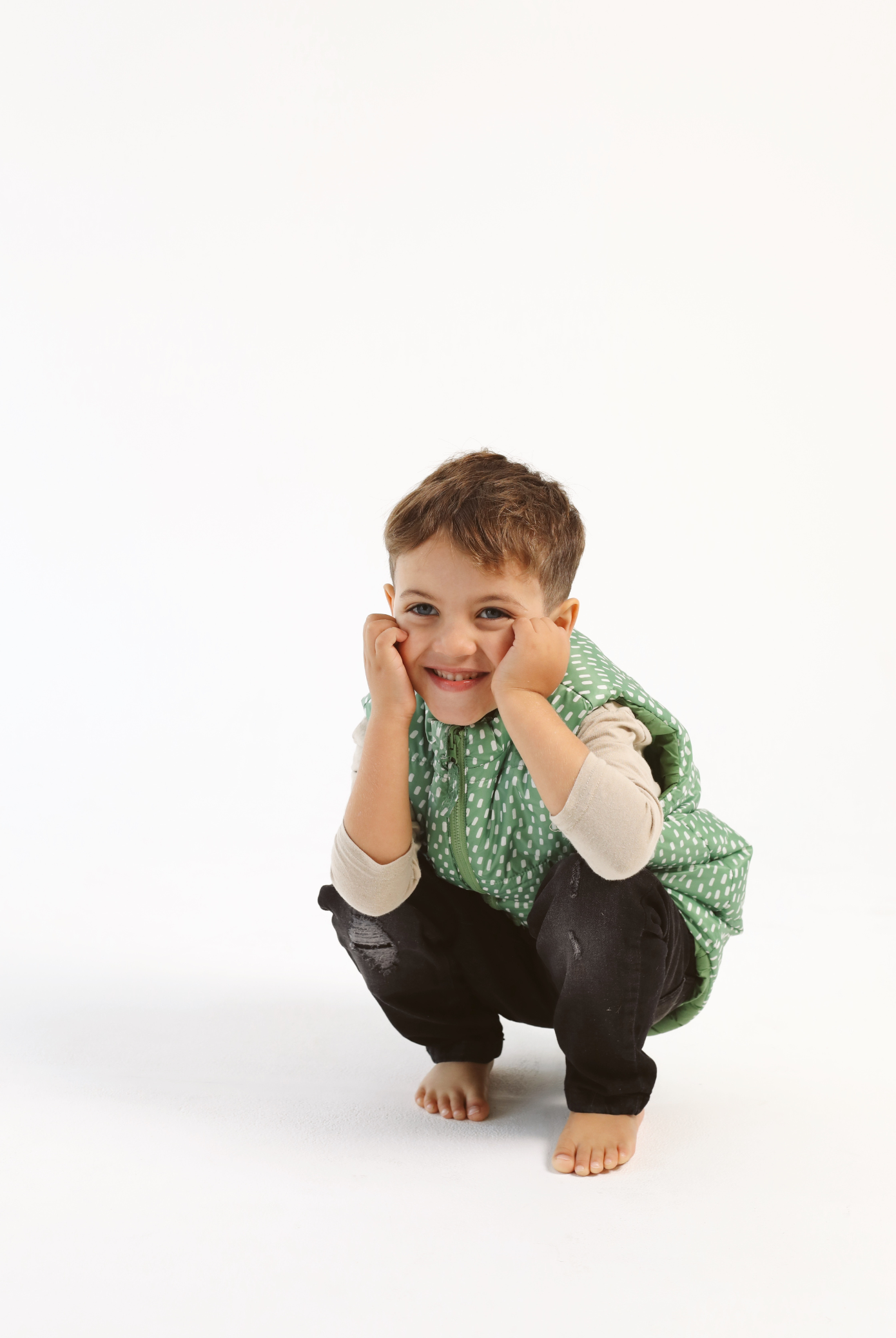 Kids Dots x Green Gilet™ — lightweight sleeveless puffer vest with playful white dot print on green, perfect for layering in South Africa