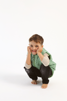 Kids Dots x Green Gilet™ — lightweight sleeveless puffer vest with playful white dot print on green, perfect for layering in South Africa