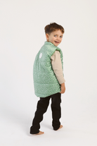 Kids Dots x Green Gilet™ — lightweight sleeveless puffer vest with playful white dot print on green, perfect for layering in South Africa