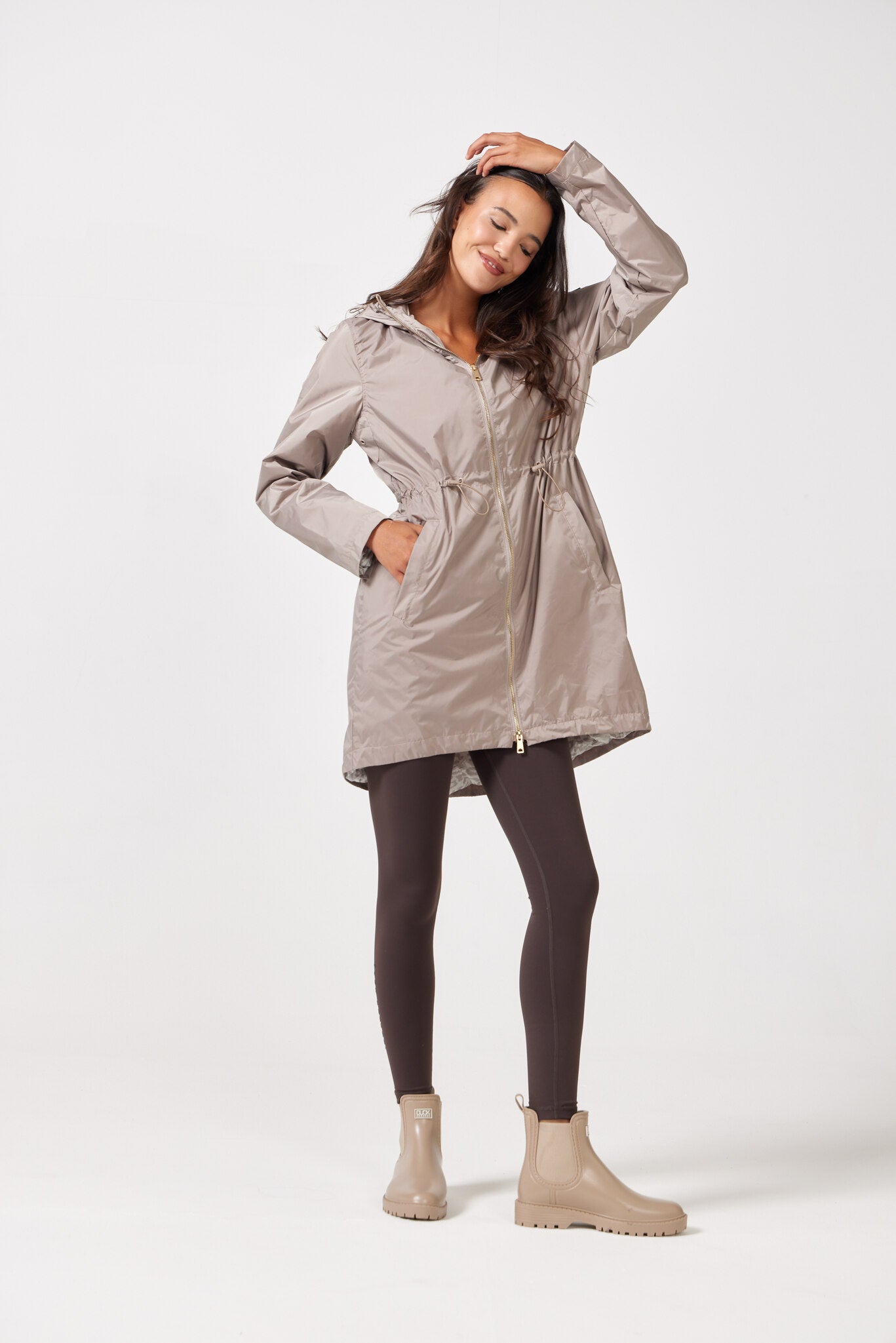 The Cairo Sands raincoat in beige, lightweight hooded waterproof raincoat ideal for South Africa rainy season and wet climate
