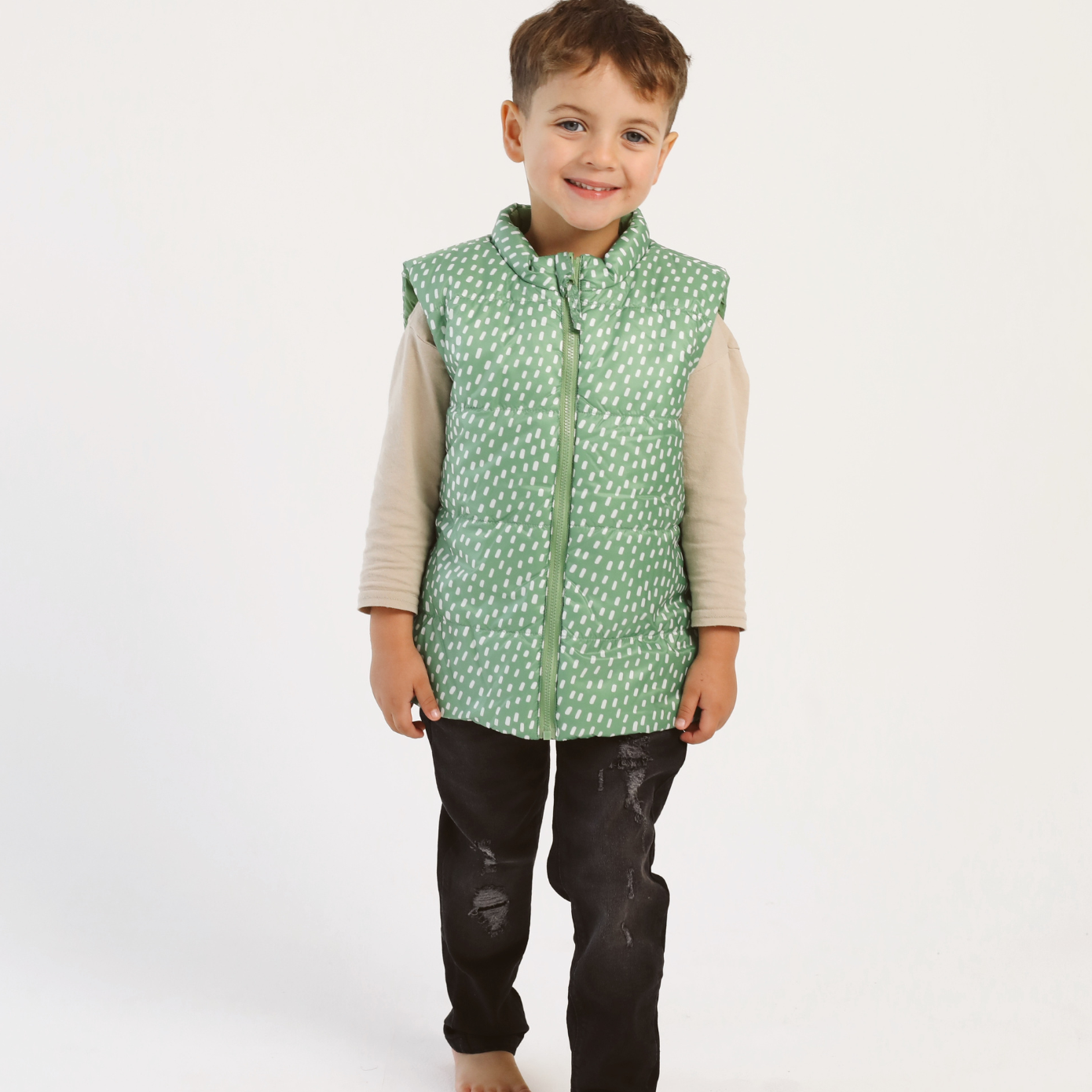 Kids Dots x Green Gilet™ — lightweight sleeveless puffer vest with playful white dot print on green, perfect for layering in South Africa