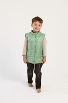 Kids Dots x Green Gilet™ — lightweight sleeveless puffer vest with playful white dot print on green, perfect for layering in South Africa
