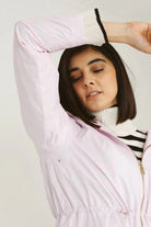 Rosewater Mist raincoat in pastel pink with hood, lightweight waterproof jacket for stylish rainy days in South Africa