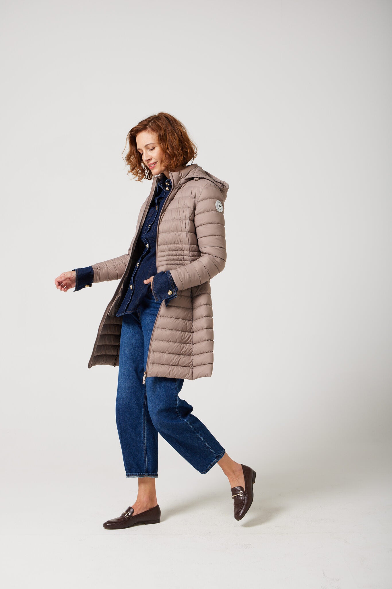 Women’s insulated midi-length hooded parka in chai beige, designed for warmth and comfort in South Africa’s winter season — Chai Midi Parka™