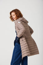 Women’s insulated midi-length hooded parka in chai beige, designed for warmth and comfort in South Africa’s winter season — Chai Midi Parka™