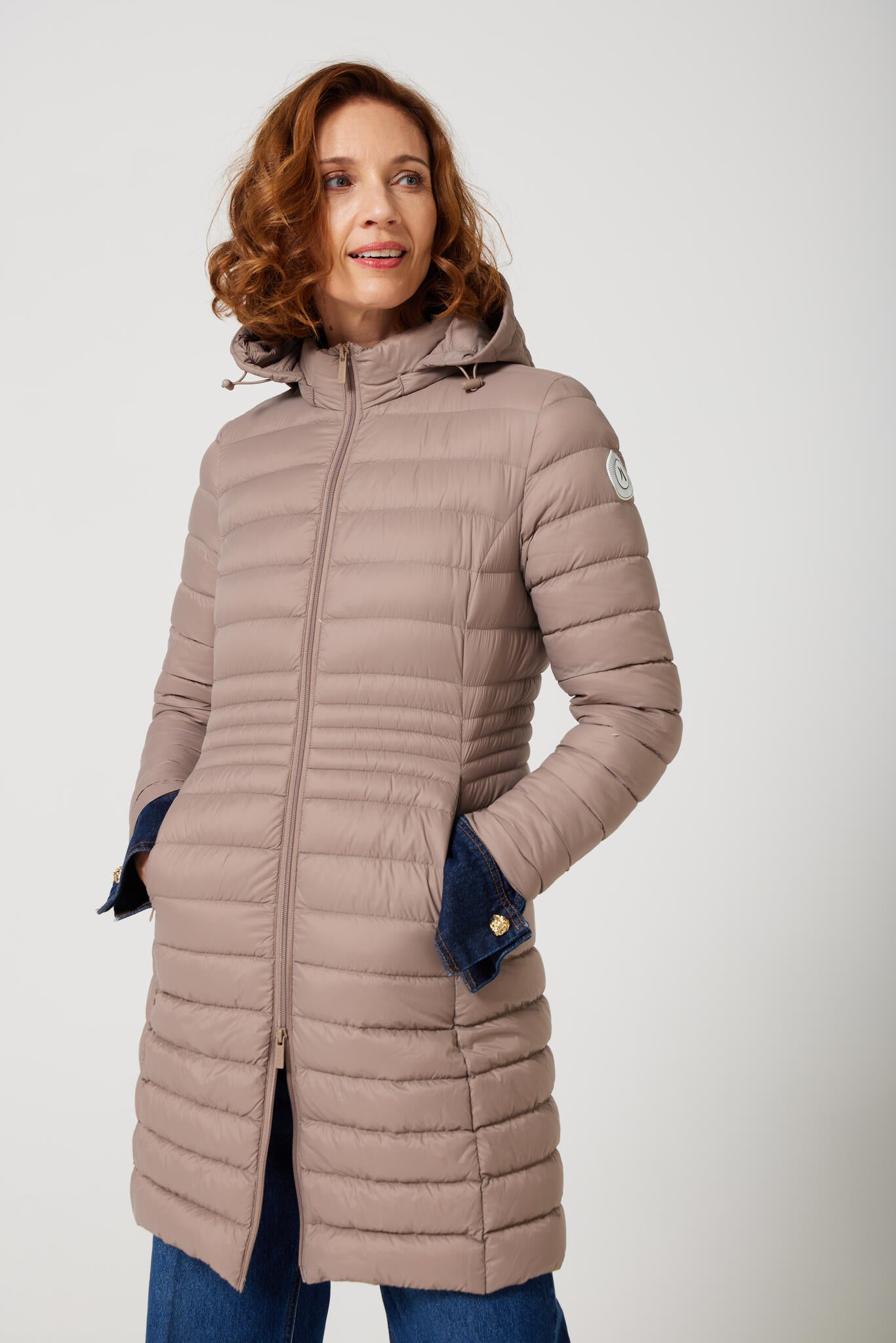 Women’s insulated midi-length hooded parka in chai beige, designed for warmth and comfort in South Africa’s winter season — Chai Midi Parka™