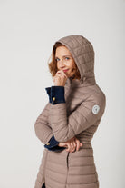 Women’s insulated midi-length hooded parka in chai beige, designed for warmth and comfort in South Africa’s winter season — Chai Midi Parka™