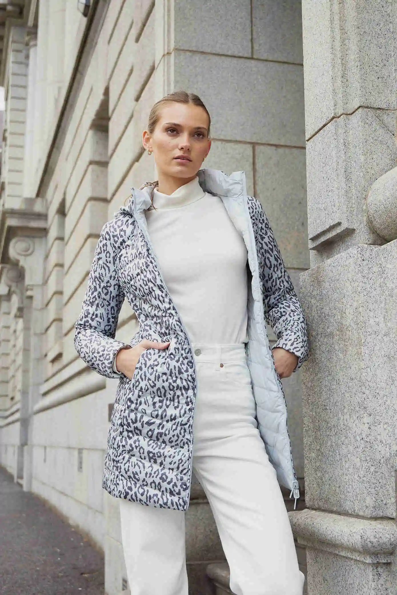 Women’s long Jaguar print parka in grey and white, lightweight insulated winter coat with hood and side pockets from Duck Apparel South Africa