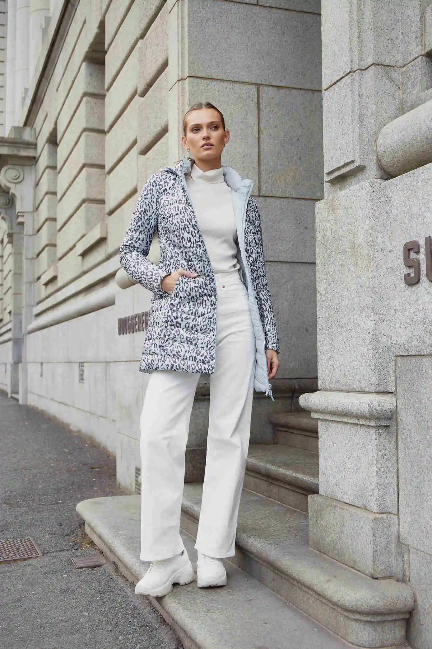 Women’s long Jaguar print parka in grey and white, lightweight insulated winter coat with hood and side pockets from Duck Apparel South Africa