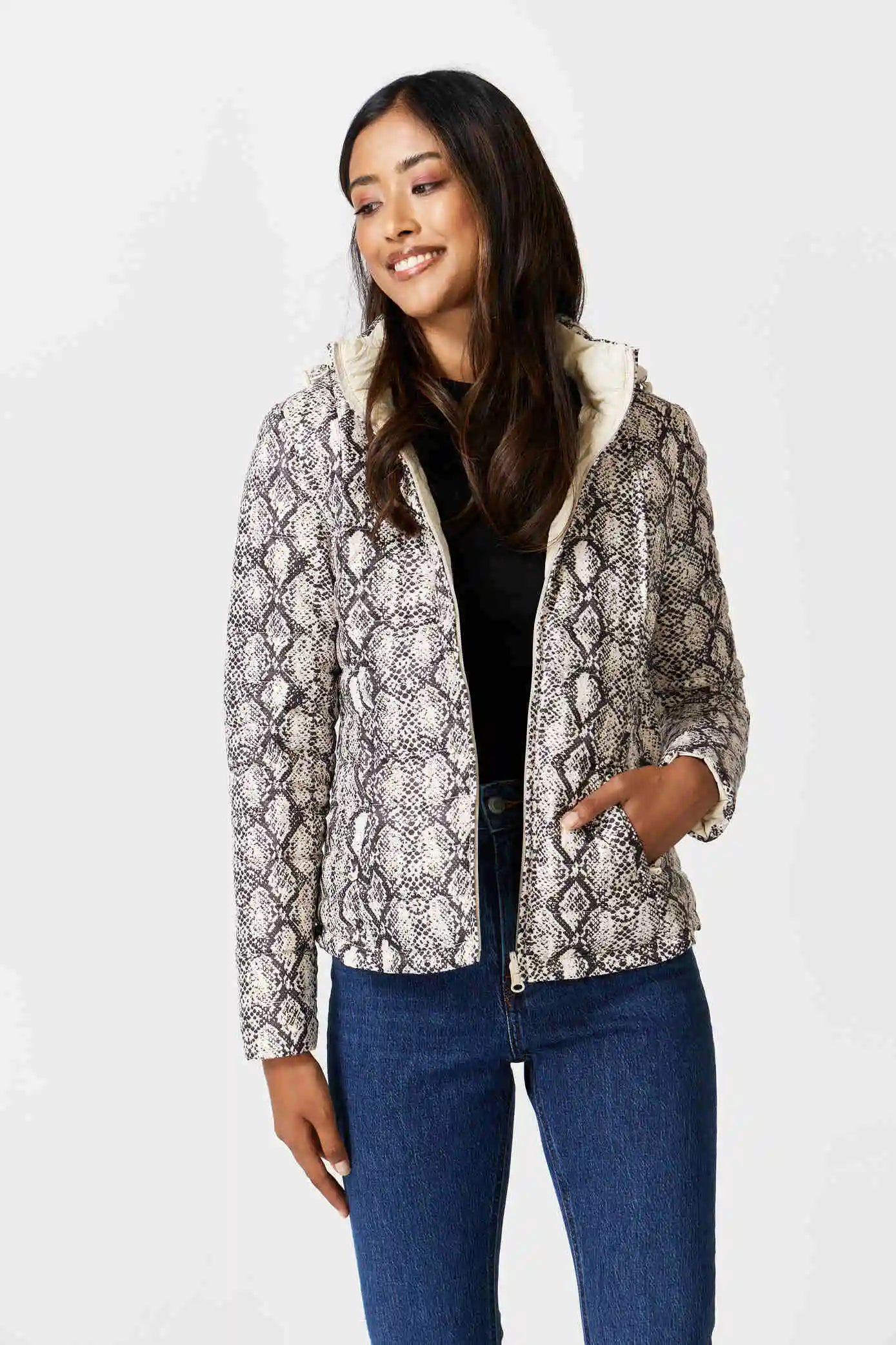 Women’s reversible cream puffer jacket with python-print inner lining and hood, lightweight insulated outerwear from Duck Apparel South Africa