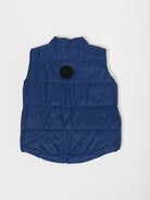 Kids Boats x Navy Gilet™ — sleeveless navy puffer vest with playful boat print, a versatile layer for kids in South Africa