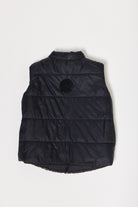 Kids Leopard x Black Gilet™ — sleeveless kids’ puffer vest in bold leopard print with black accents, a fun winter essential in South Africa