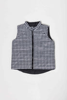 Kids Houndstooth x Black Gilet™ — sleeveless black puffer vest with bold houndstooth print, a versatile winter layer for kids in South Africa