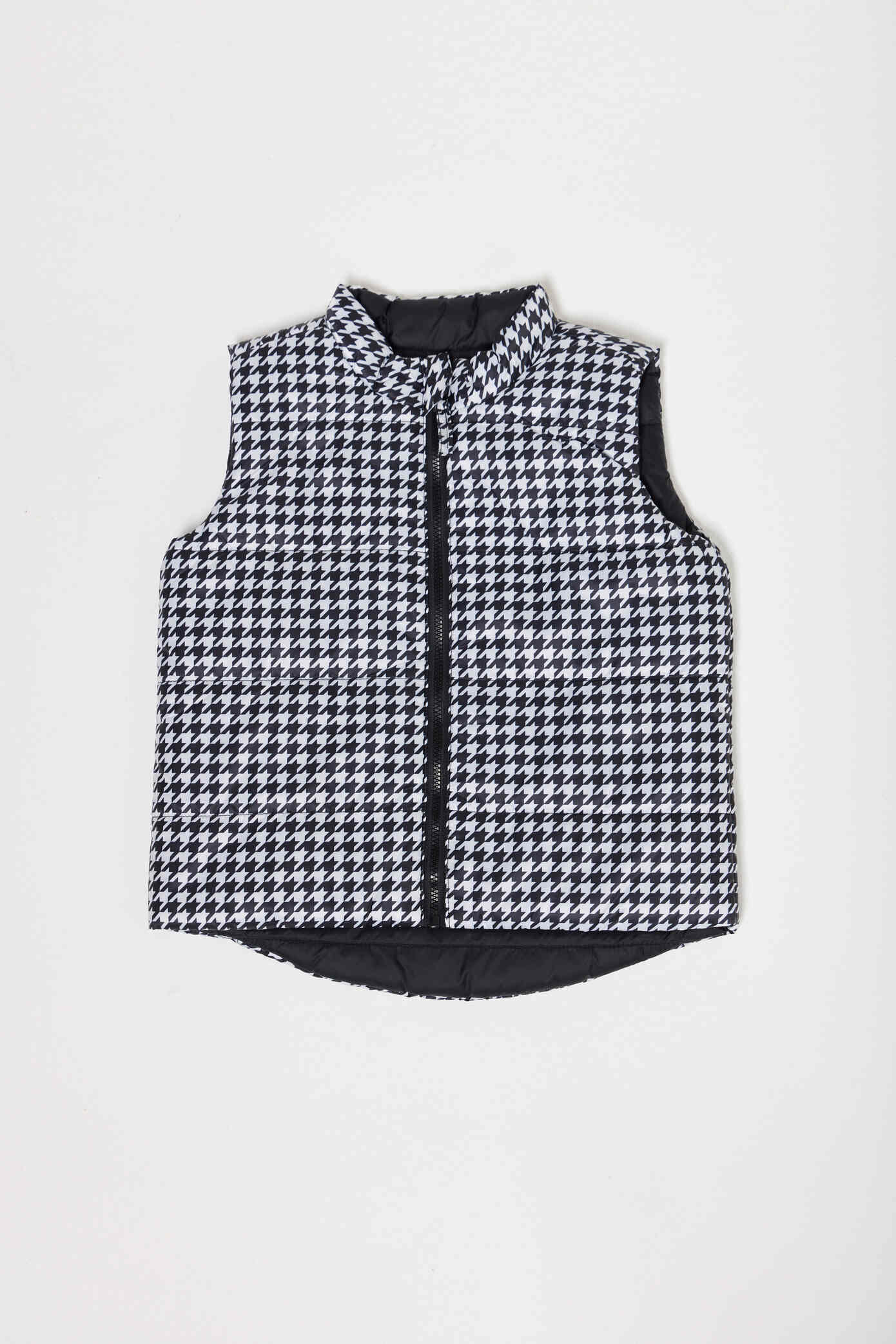 Kids Houndstooth x Black Gilet™ — sleeveless black puffer vest with bold houndstooth print, a versatile winter layer for kids in South Africa