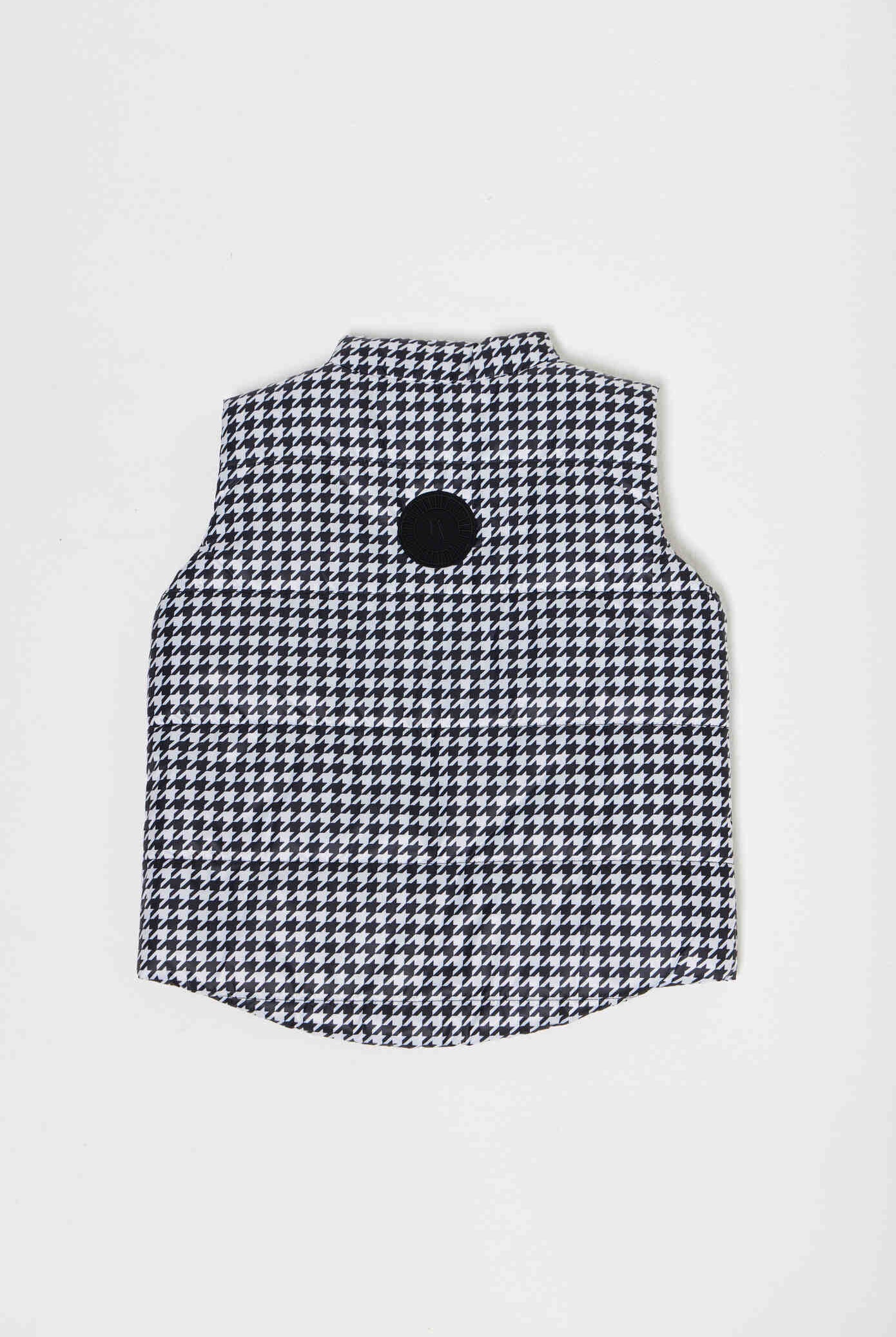 Kids Houndstooth x Black Gilet™ — sleeveless black puffer vest with bold houndstooth print, a versatile winter layer for kids in South Africa