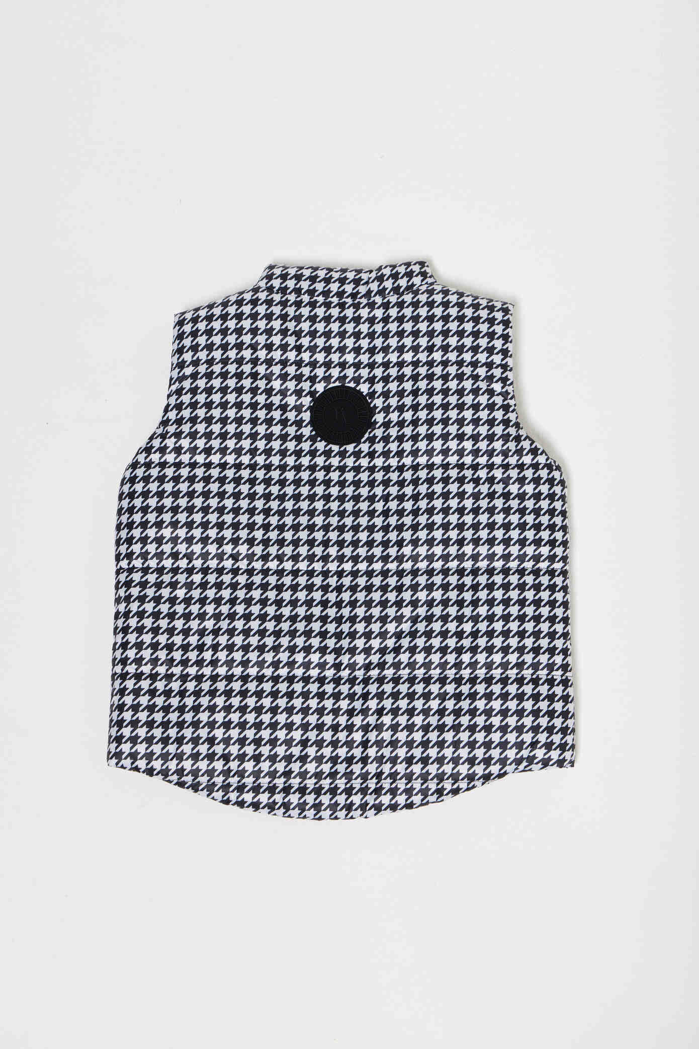 Kids Houndstooth x Black Gilet™ — sleeveless black puffer vest with bold houndstooth print, a versatile winter layer for kids in South Africa