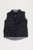 Kids Houndstooth x Black Gilet™ — sleeveless black puffer vest with bold houndstooth print, a versatile winter layer for kids in South Africa