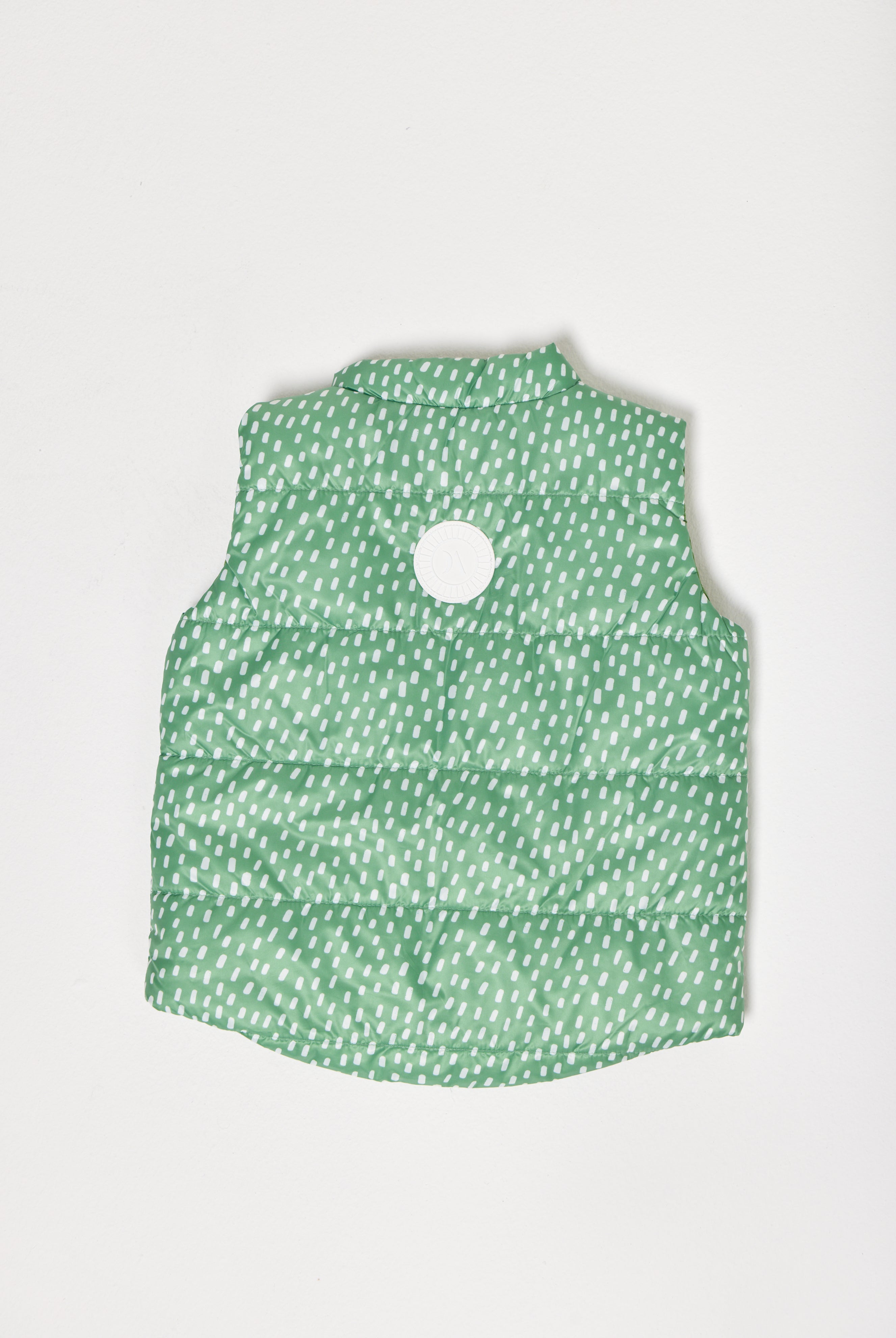 Kids Dots x Green Gilet™ — lightweight sleeveless puffer vest with playful white dot print on green, perfect for layering in South Africa