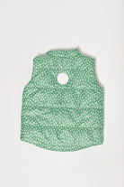 Kids Dots x Green Gilet™ — lightweight sleeveless puffer vest with playful white dot print on green, perfect for layering in South Africa