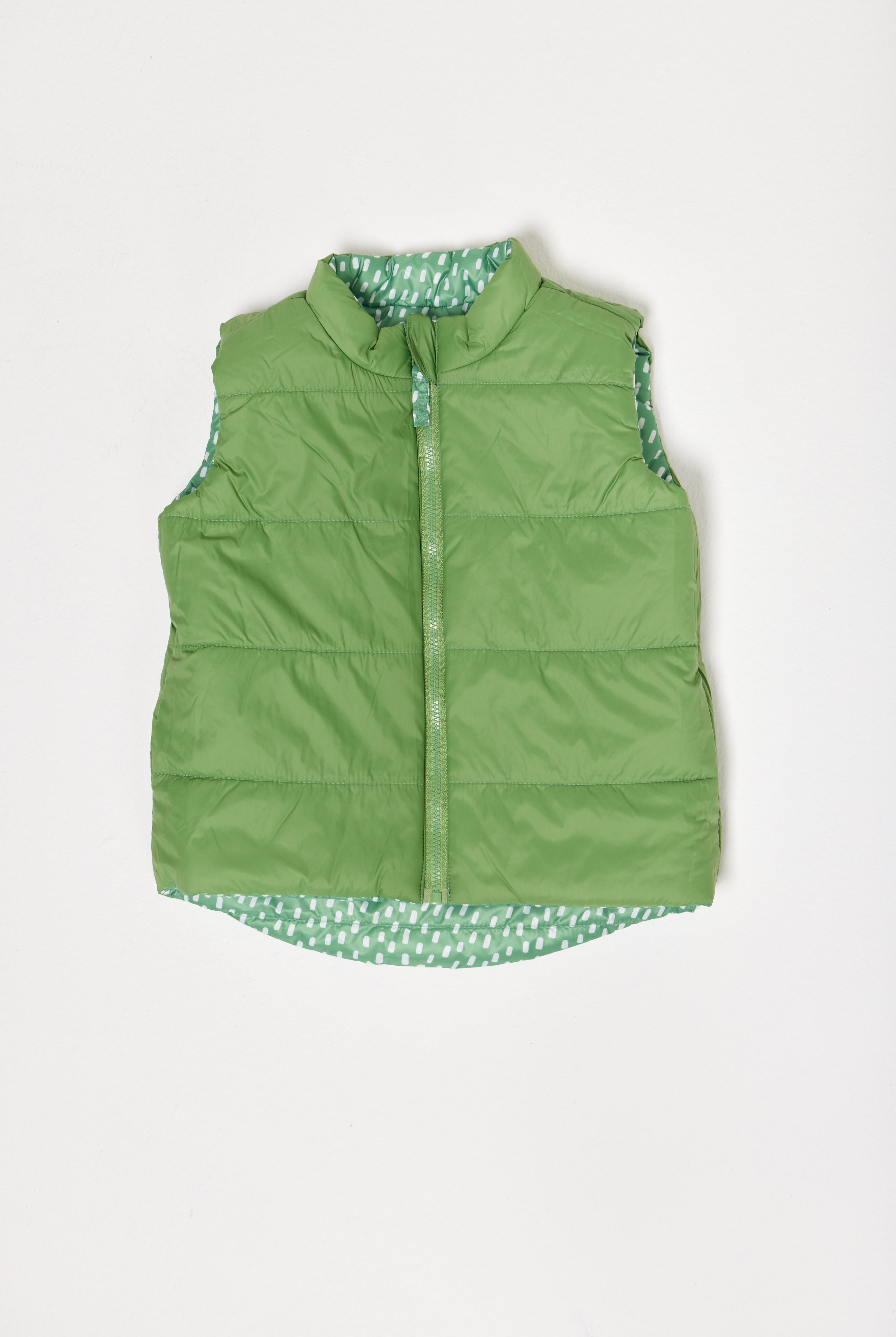 Kids Dots x Green Gilet™ — lightweight sleeveless puffer vest with playful white dot print on green, perfect for layering in South Africa
