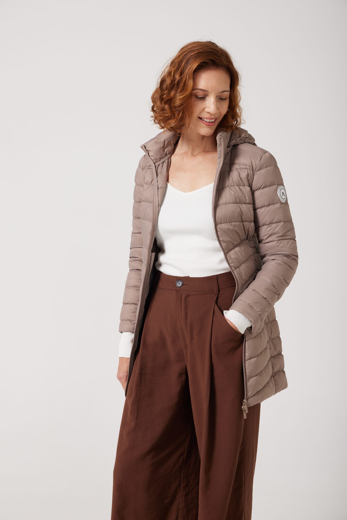 Chai Classic Parka™ in soft beige chai shade, insulated hooded parka designed for warmth and comfort in South Africa’s winter season