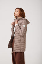 Chai Classic Parka™ in soft beige chai shade, insulated hooded parka designed for warmth and comfort in South Africa’s winter season