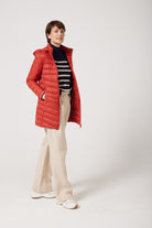 Women’s insulated hooded parka in rust red, designed for warmth and comfort in South Africa’s winter season — Rust Classic Parka™