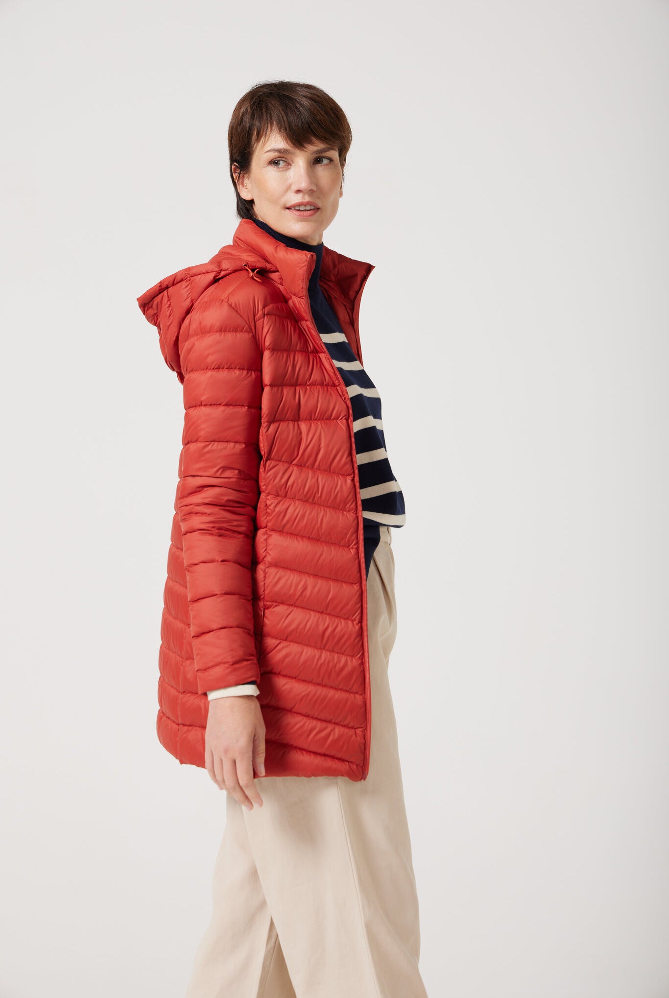 Women’s insulated hooded parka in rust red, designed for warmth and comfort in South Africa’s winter season — Rust Classic Parka™