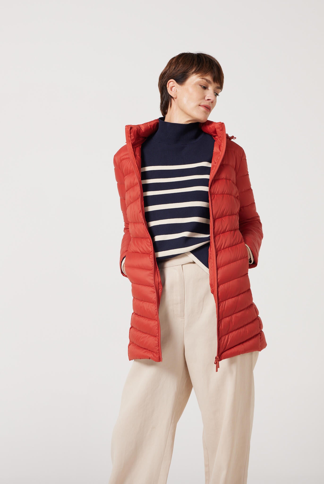 Women’s insulated hooded parka in rust red, designed for warmth and comfort in South Africa’s winter season — Rust Classic Parka™