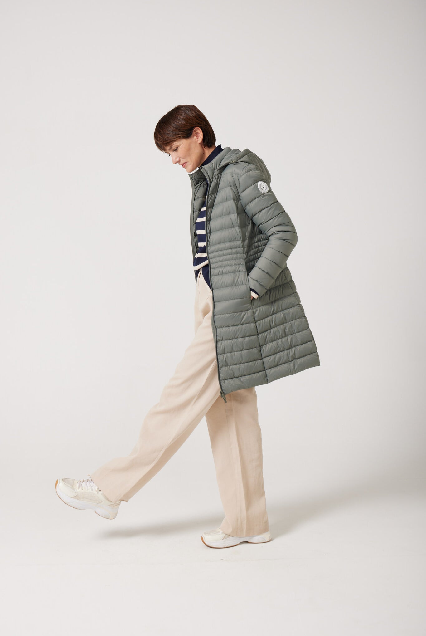 Women’s insulated midi-length hooded parka in sage green, designed for warmth and comfort in South Africa’s winter season — Sage Midi Parka™