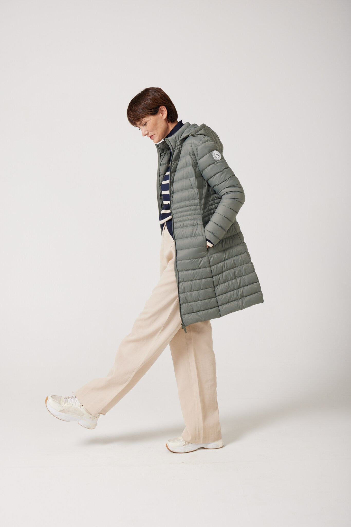 Women’s insulated midi-length hooded parka in sage green, designed for warmth and comfort in South Africa’s winter season — Sage Midi Parka™