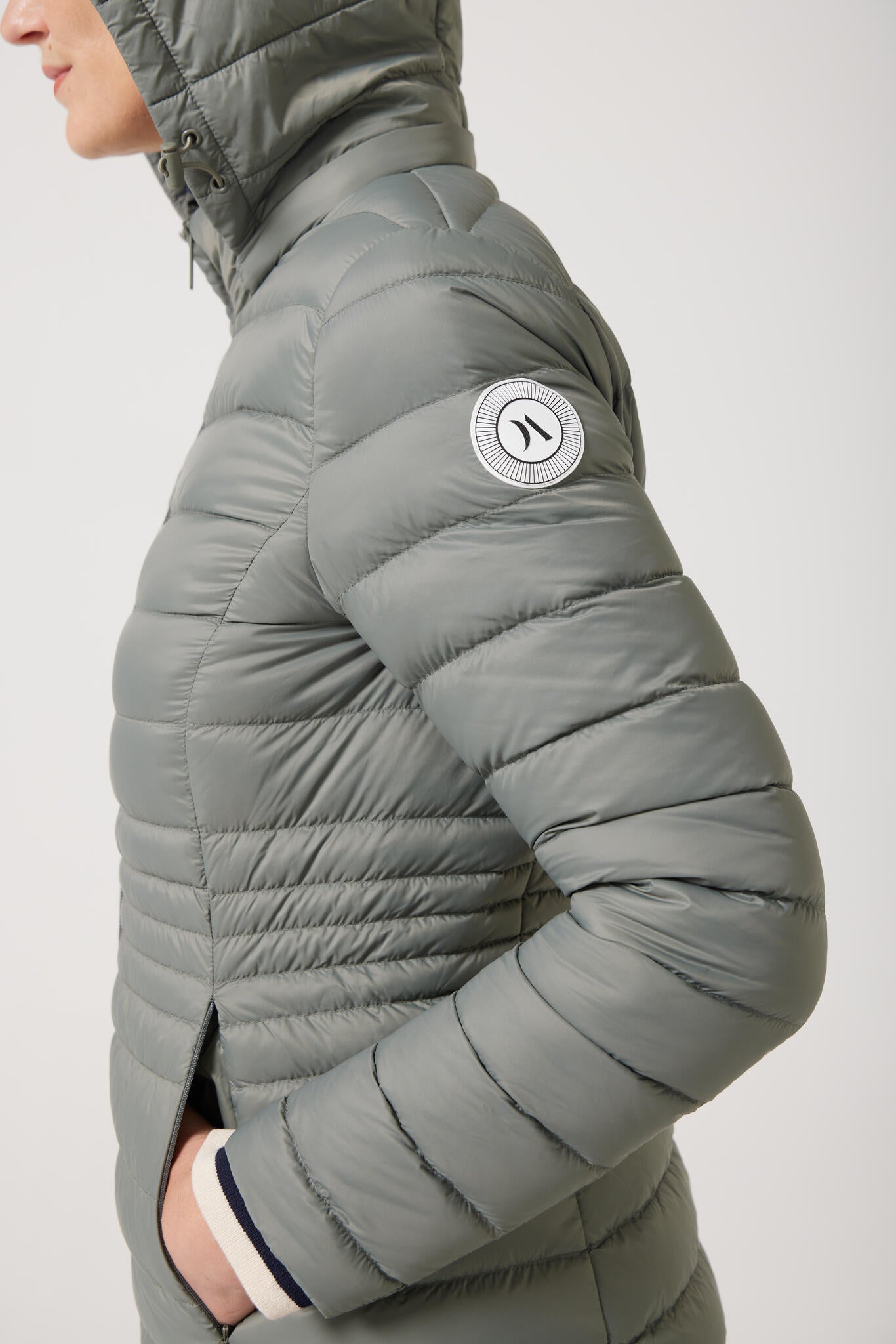 Women’s insulated midi-length hooded parka in sage green, designed for warmth and comfort in South Africa’s winter season — Sage Midi Parka™