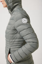 Women’s insulated midi-length hooded parka in sage green, designed for warmth and comfort in South Africa’s winter season — Sage Midi Parka™