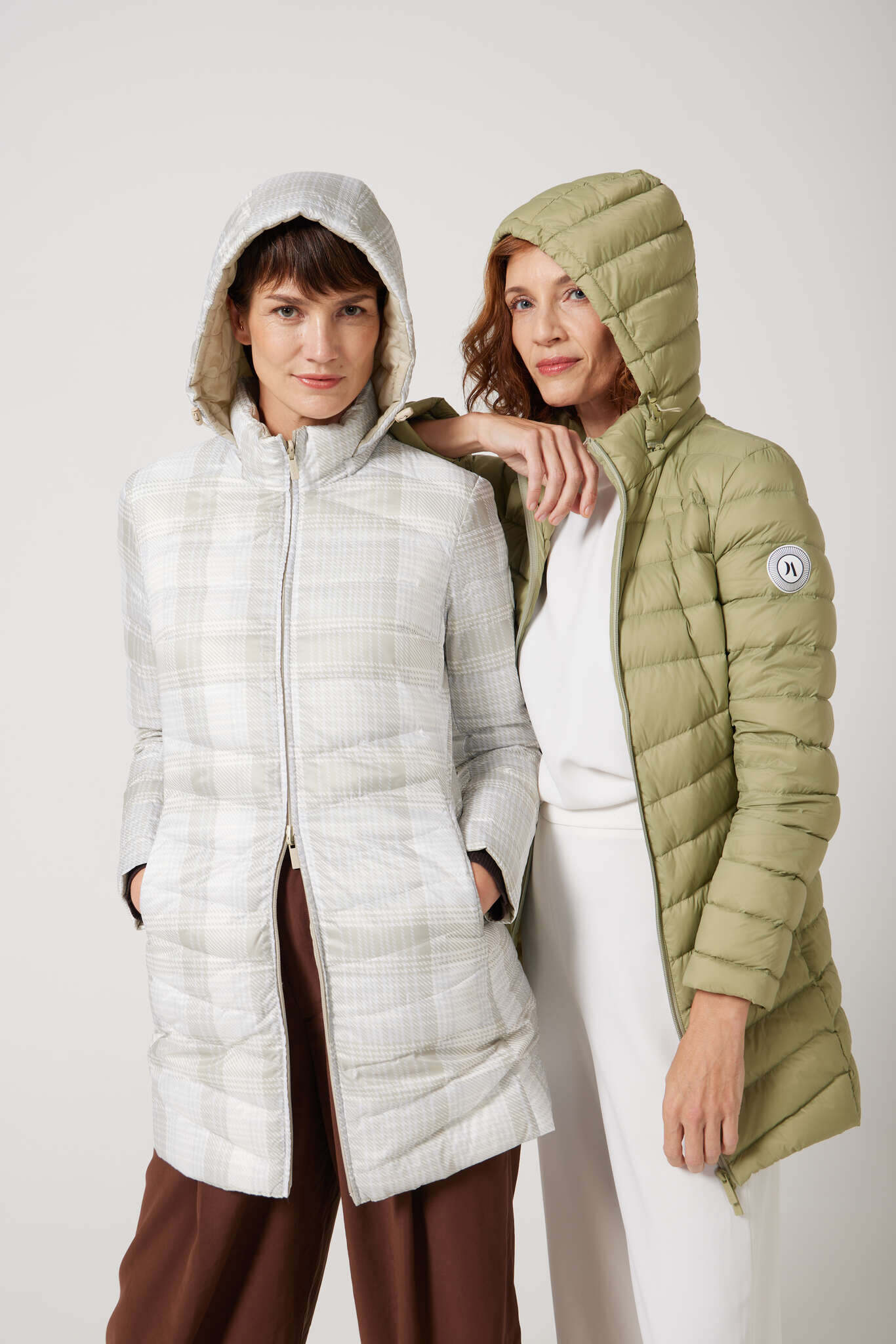 Tartan x Mist Classic Parka™ in light tartan check, insulated hooded reversible parka offering warmth and versatility for South Africa’s winter season and Matcha Classic Parka™ in light green matcha shade, insulated hooded parka designed for warmth and comfort in South Africa’s winter season