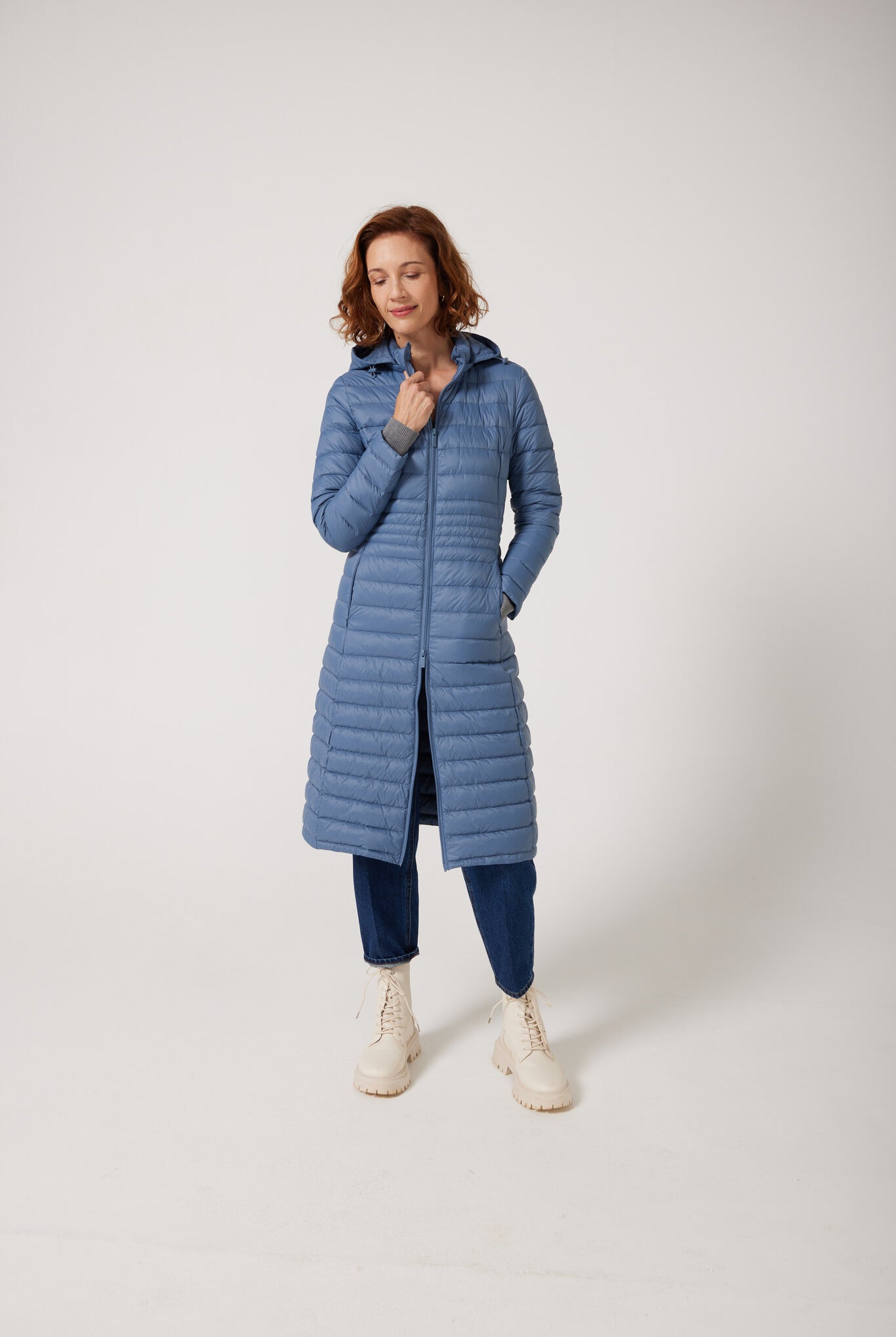 Women’s insulated ultra-length hooded parka in sky blue, designed for extra warmth and comfort in South Africa’s winter season — Vista Ultra Parka™