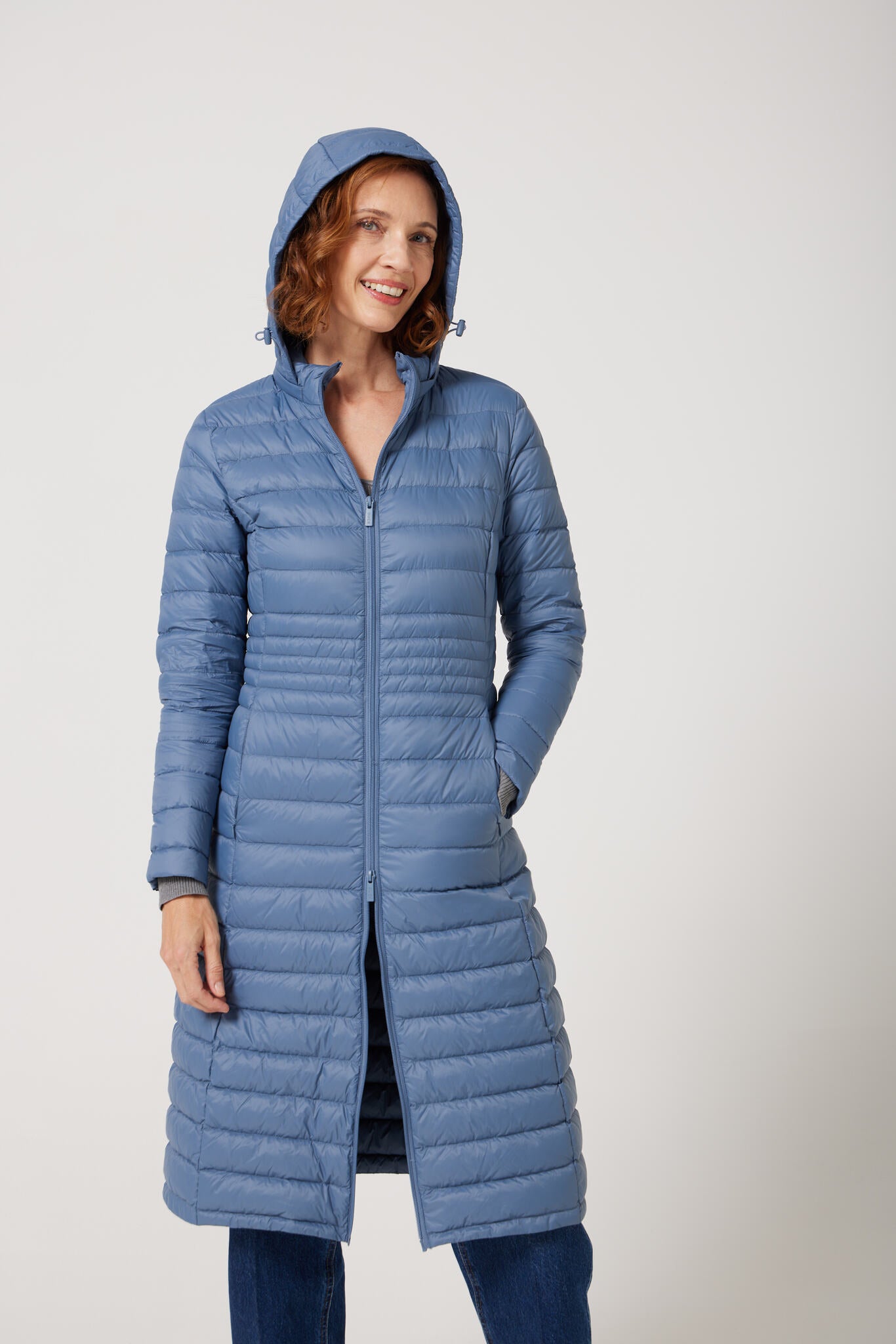 Women’s insulated ultra-length hooded parka in sky blue, designed for extra warmth and comfort in South Africa’s winter season — Vista Ultra Parka™