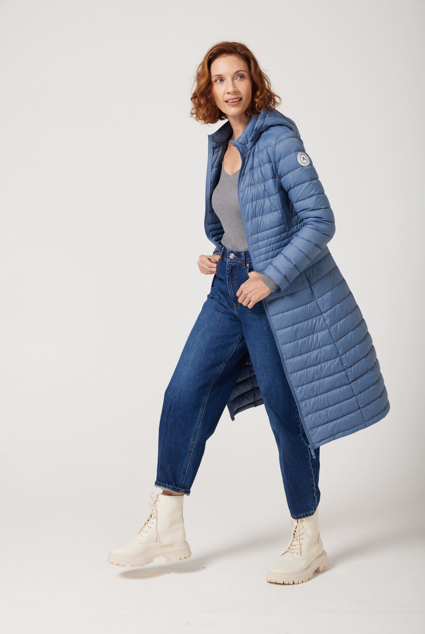 Women’s insulated ultra-length hooded parka in sky blue, designed for extra warmth and comfort in South Africa’s winter season — Vista Ultra Parka™