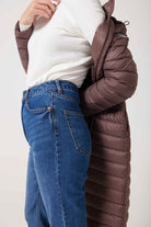 Women’s insulated ultra-length hooded parka in espresso brown, designed for extra warmth and comfort in South Africa’s winter season — Espresso Ultra Parka™