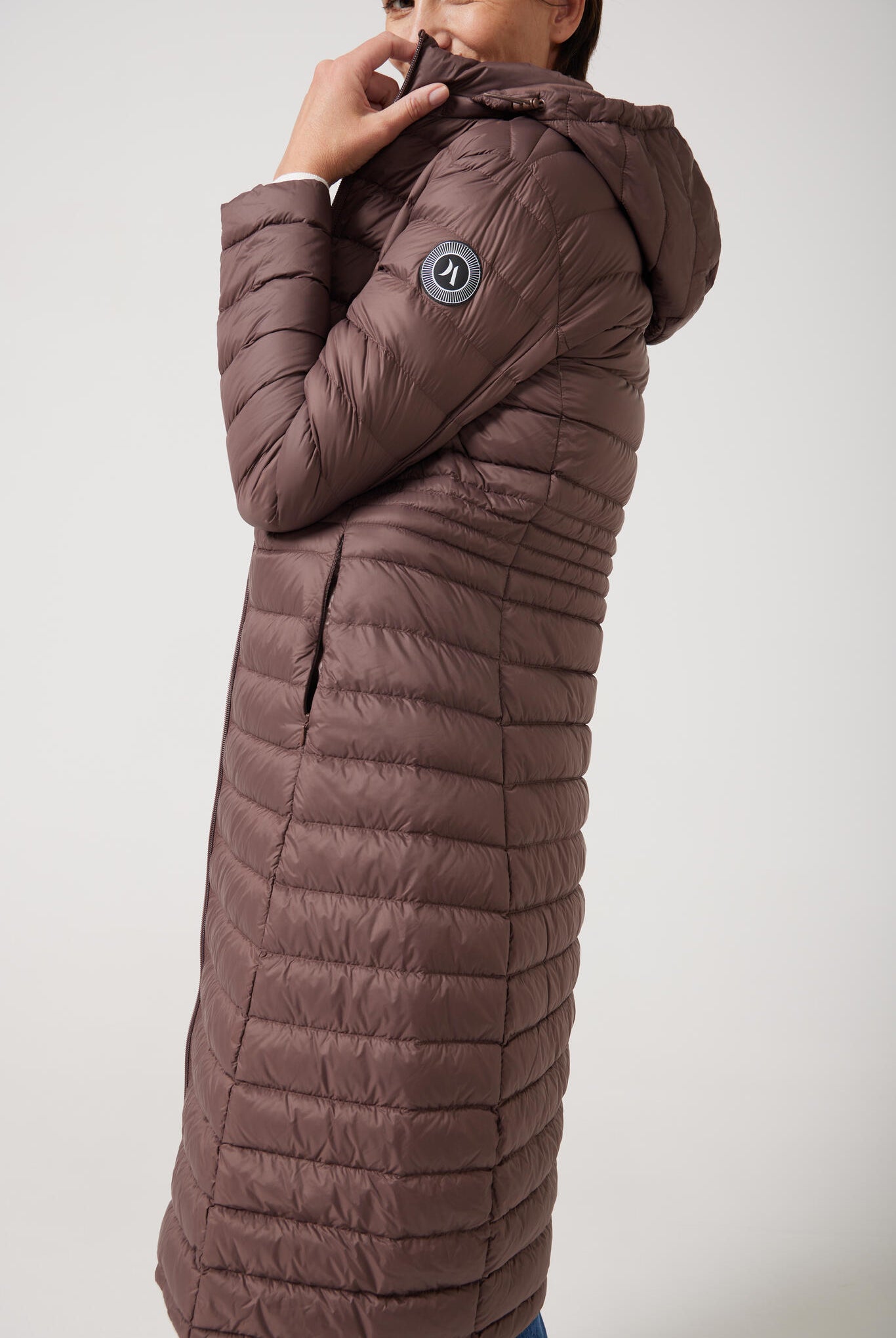 Women’s insulated ultra-length hooded parka in espresso brown, designed for extra warmth and comfort in South Africa’s winter season — Espresso Ultra Parka™