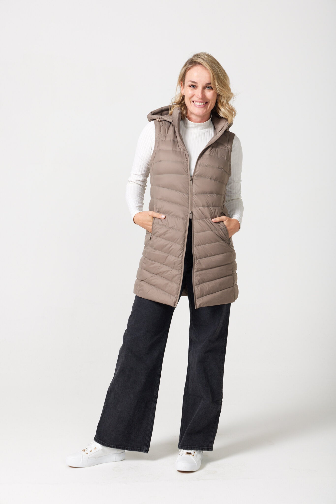 Chai Longline Gilet™ — women’s sleeveless quilted puffer vest in neutral chai brown, longline design with hood, ideal for layering in South Africa