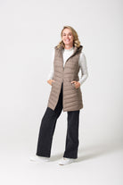 Chai Longline Gilet™ — women’s sleeveless quilted puffer vest in neutral chai brown, longline design with hood, ideal for layering in South Africa