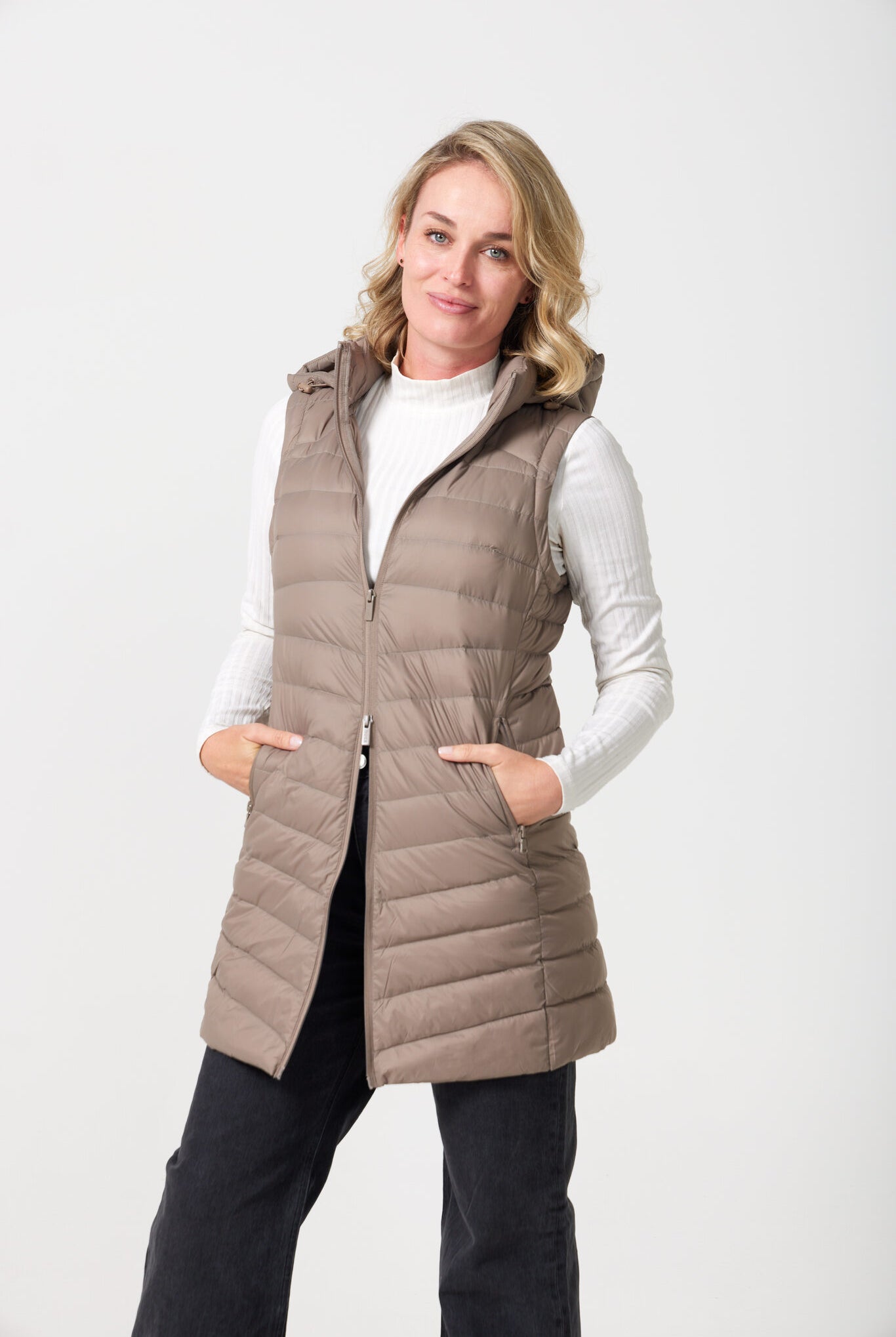 Chai Longline Gilet™ — women’s sleeveless quilted puffer vest in neutral chai brown, longline design with hood, ideal for layering in South Africa