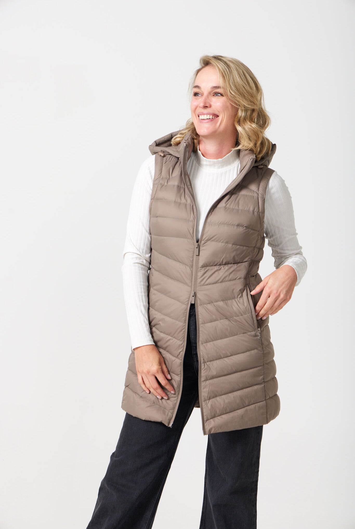 Chai Longline Gilet™ — women’s sleeveless quilted puffer vest in neutral chai brown, longline design with hood, ideal for layering in South Africa